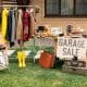 Organise a successfule garage sale. Items displayed on the lawn.