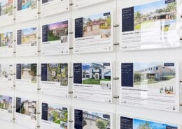 Buying a house or apartment. Ap-realty showcase wall of available properties.